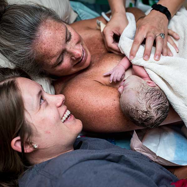 Happy family after giving birth Wisconsin Doula